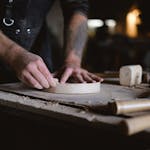 Crop artisan polishing wooden board